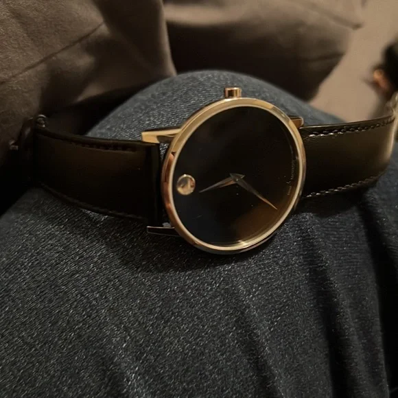 Stainless steel water resistant sapphire crystal Movado watch. Barely used.